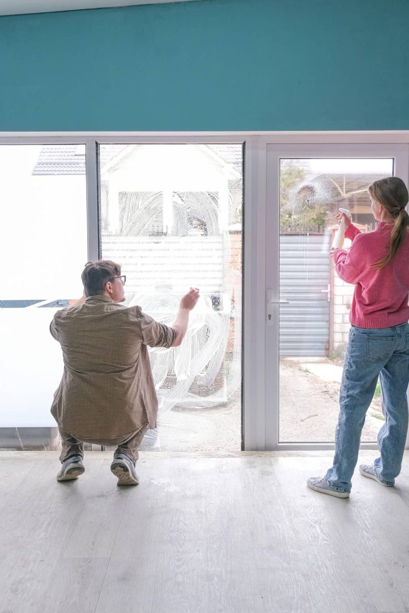 couple cleaning windows and doors glass at home couple cleaning windows and doors glass at home, house routine, chores